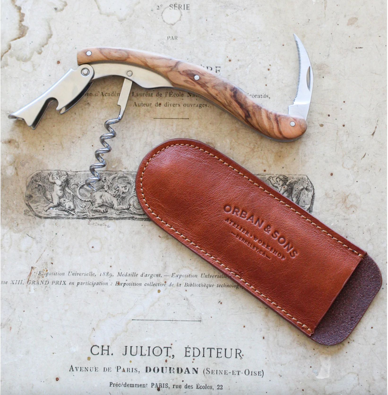 Olive wood corkscrew in a leather sheath